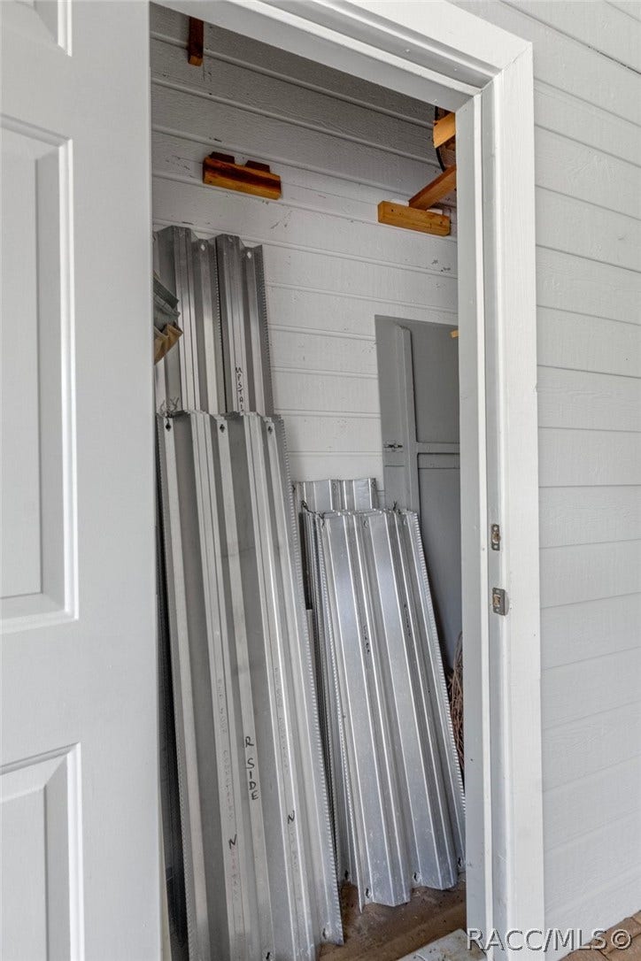 1035 N Appalachian Terrace, Crystal River, FL 34429 neatlly labeled hurricane shutters