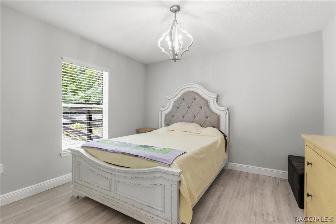 2nd bedroom.  (The ceiling light fixture will be replaced with a ceiling fan.)