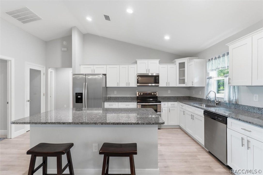 Breakfast bar off kitchen island