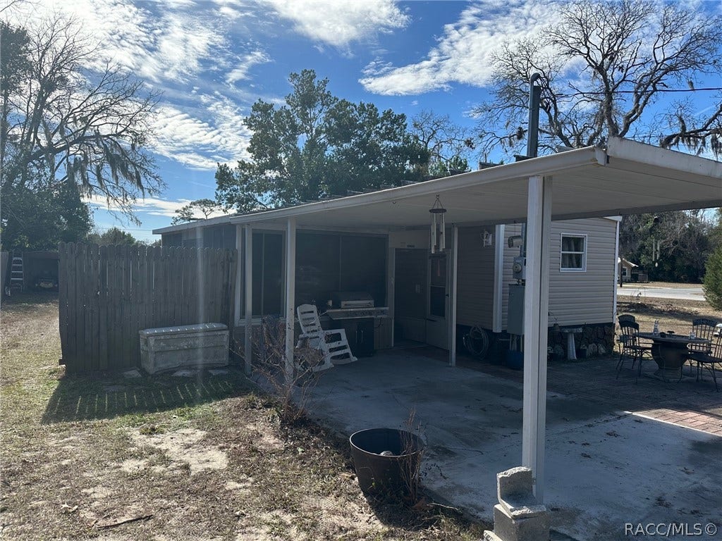 6545 S Gross Avenue, Homosassa, FL 34446 Carport and rear screened porch