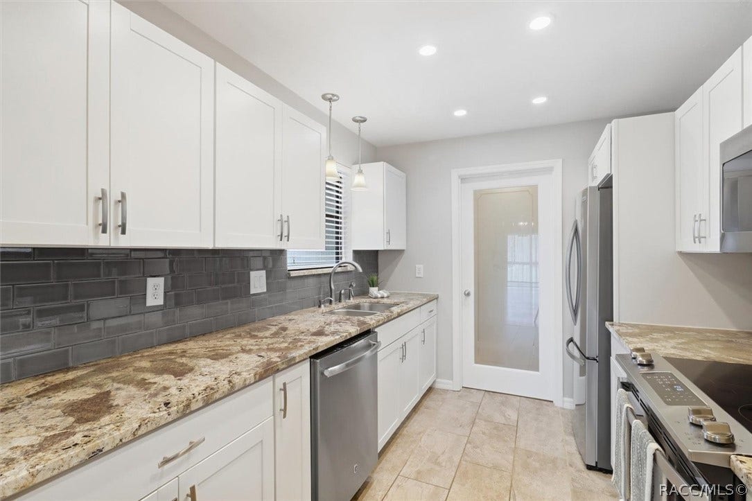 681 E Hartford Street, #6A, Hernando, FL 34442 White cabinets