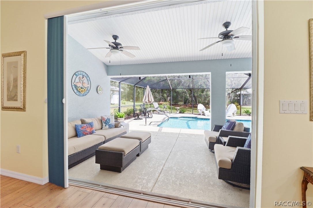 2593 S Columbine Avenue, Homosassa, FL 34448 Covered Lanai Large covered outdoor living area opening directly from the home and overlooking the screened pool. Great for entertaining.