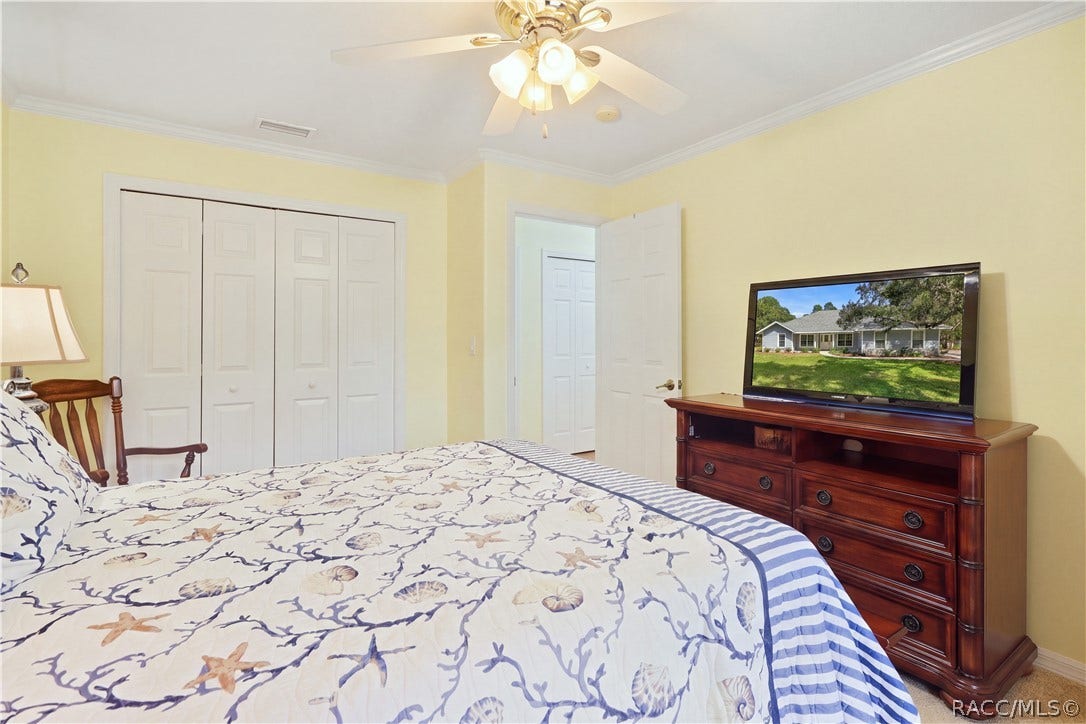 2593 S Columbine Avenue, Homosassa, FL 34448 Guest Bedroom Alternate view showing ample closet space and room for additional furnishings.