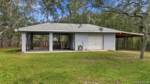2593 S Columbine Avenue, Homosassa, FL 34448 Detached 20 x20 Garage/Outbuilding/Workshop PLUS 2 Carports w/a Concrete Slab & a POLE BARN Separate detached garage/outbuilding offering additional covered space, storage & plenty of possibilities.