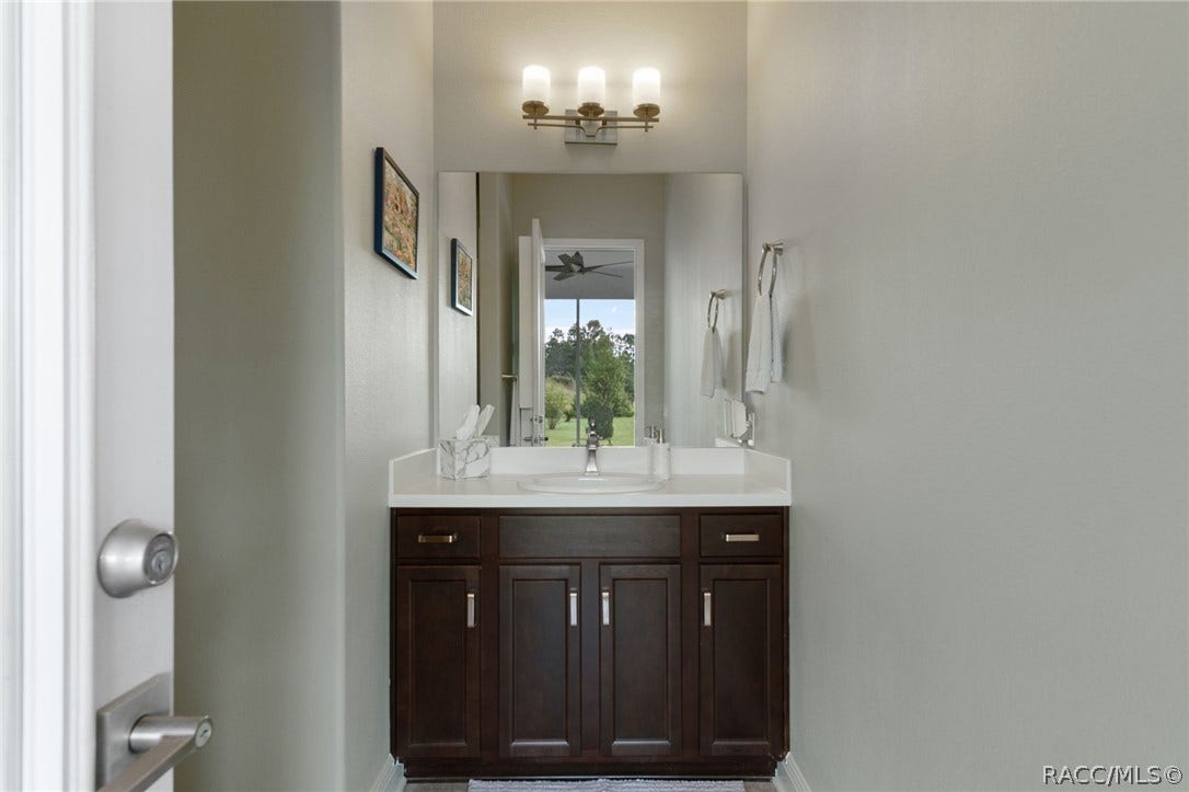 224 S Paladinn Circle, Inverness, FL 34453 outside lanai bathroom