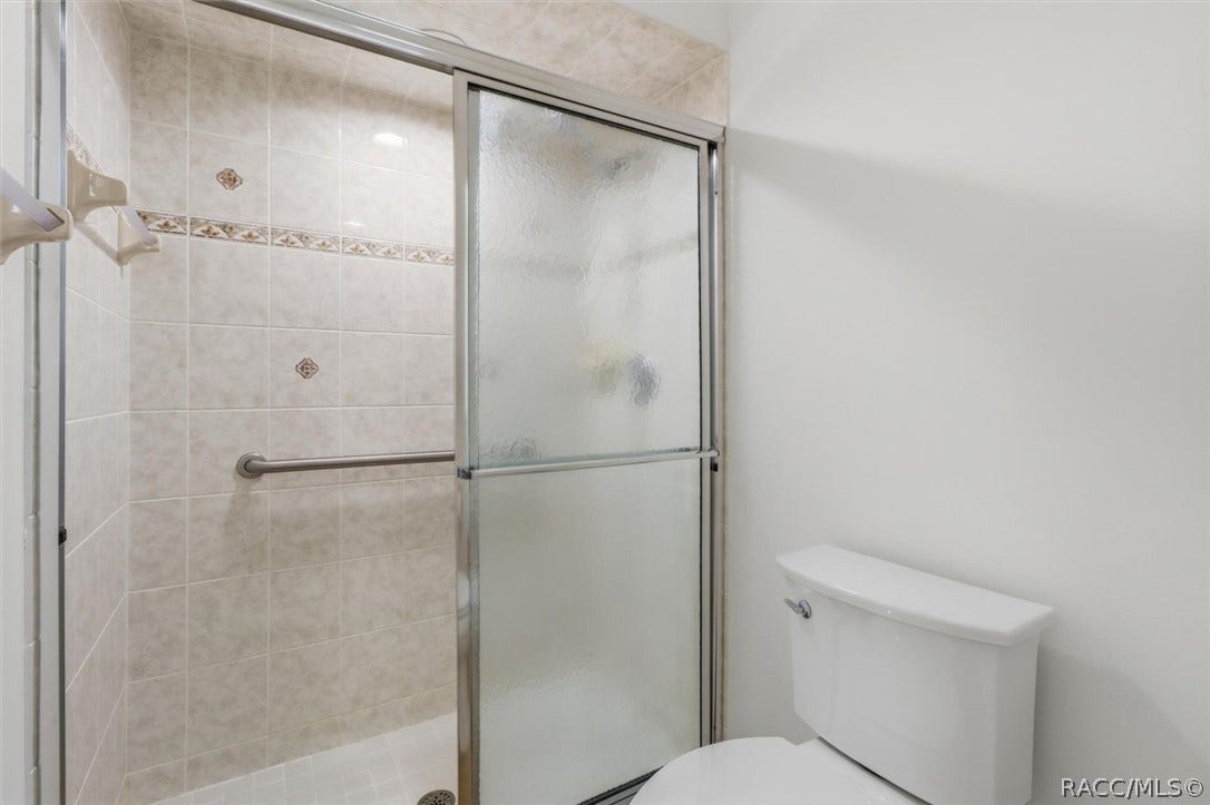 3694 S Belgrave Drive, Inverness, FL 34452 Walk-in shower and upgraded toilet