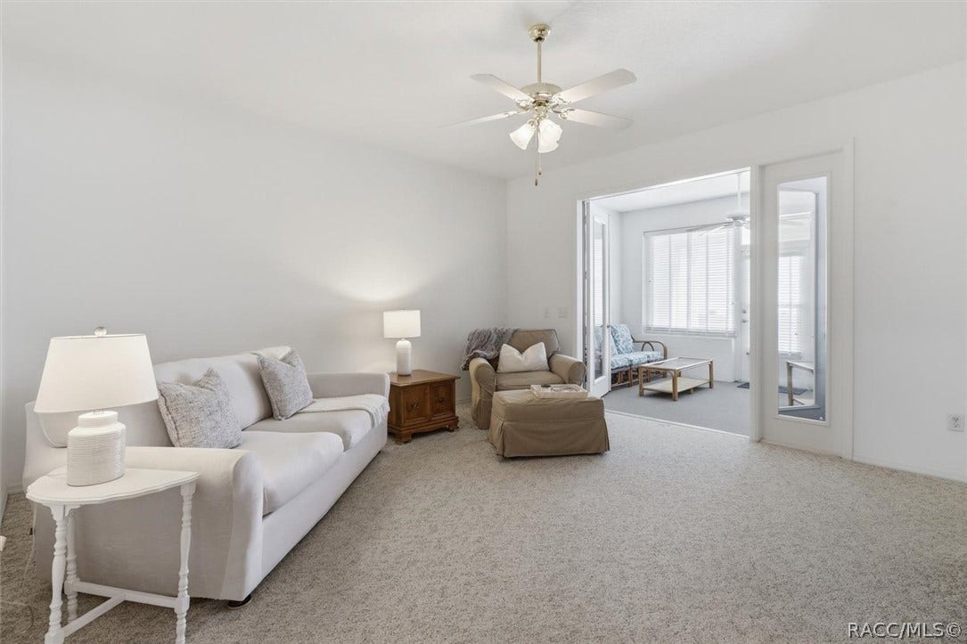 3694 S Belgrave Drive, Inverness, FL 34452 Living w/ french doors out to Florida Room