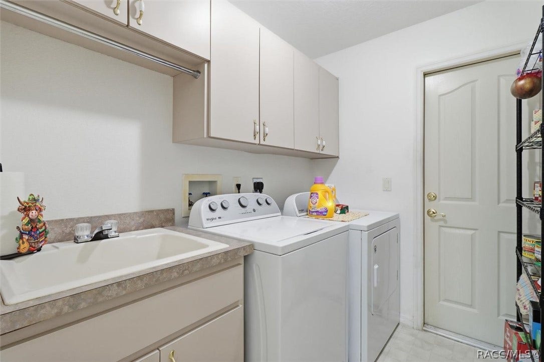 80 Oak Village Boulevard, Homosassa, FL 34446 Laundry room with utility sink