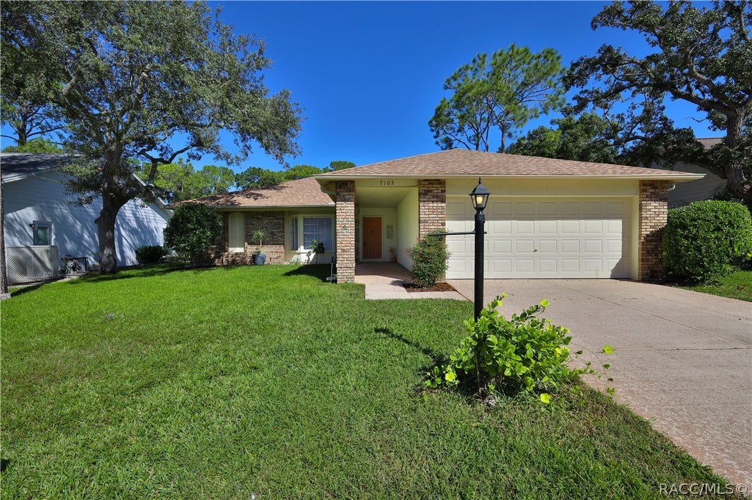 7103 Crown Oaks Drive, Spring Hill, FL 34606