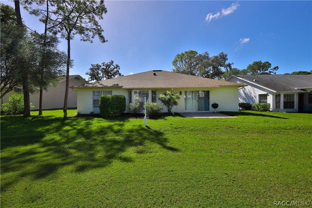 7103 Crown Oaks Drive, Spring Hill, FL 34606