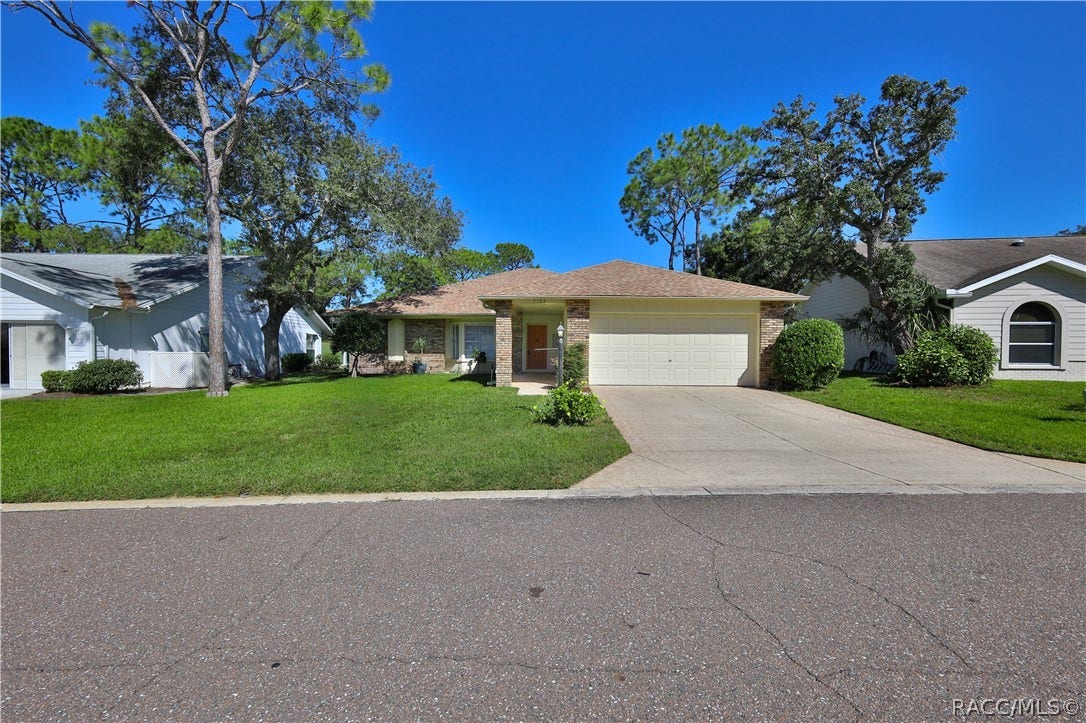 7103 Crown Oaks Drive, Spring Hill, FL 34606