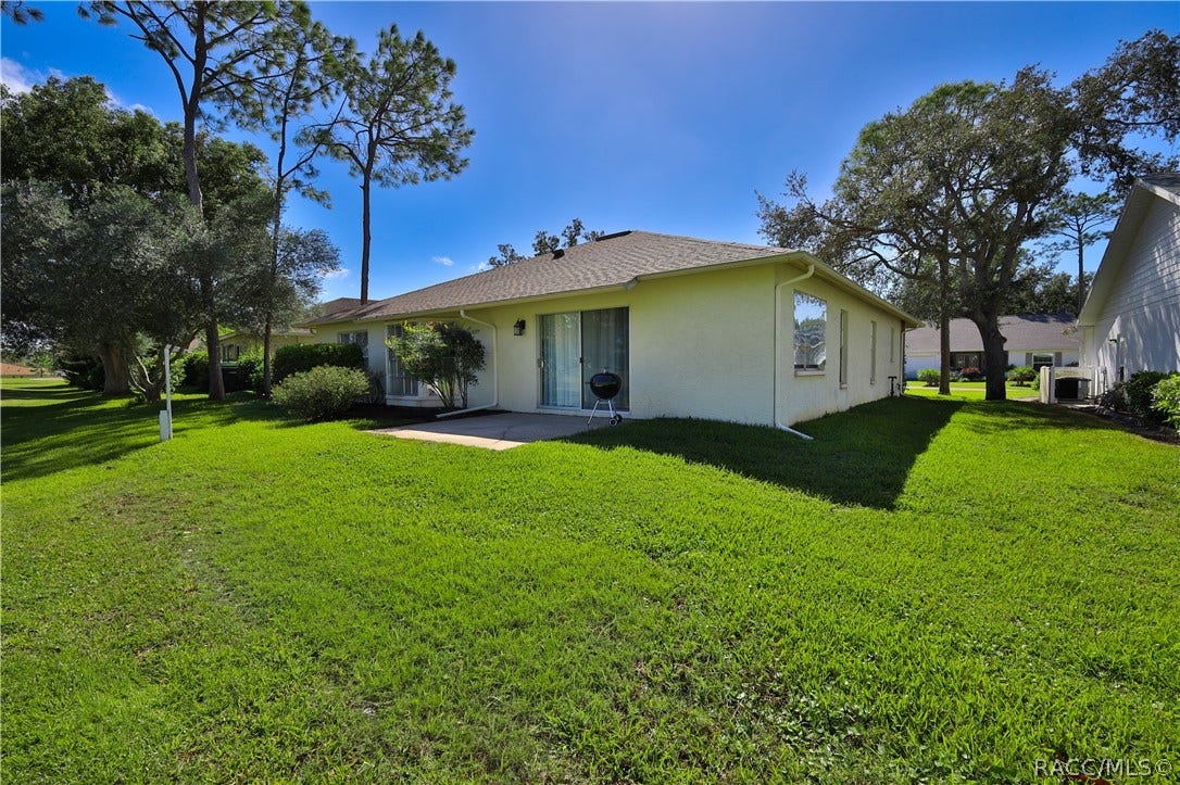 7103 Crown Oaks Drive, Spring Hill, FL 34606
