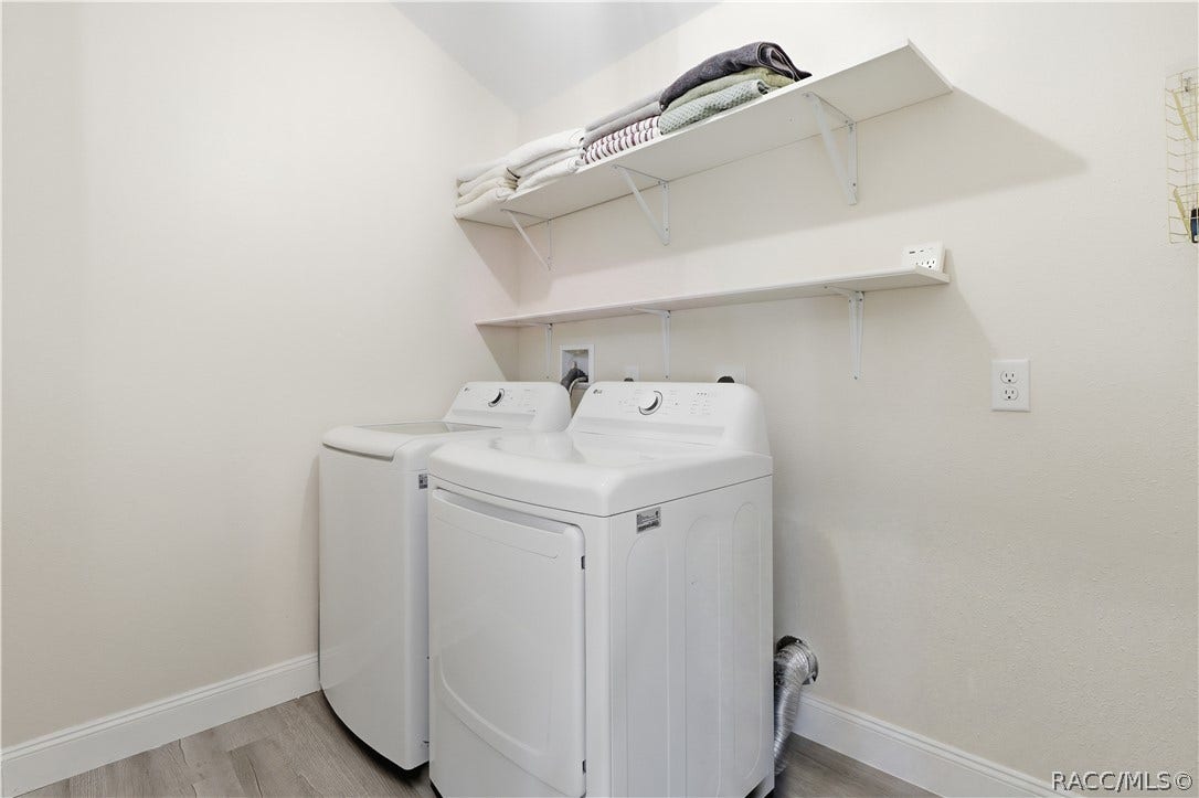 6230 W Glen Robbin Court, Crystal River, FL 34429 Indoor Laundry Room Convenient INDOOR LAUNDRY featuring a washer, dryer & overhead shelving for additional storage. Everything has its place!