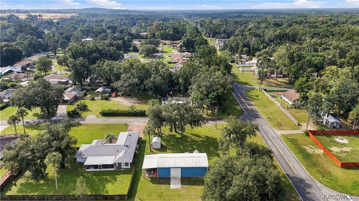 6230 W Glen Robbin Court, Crystal River, FL 34429 Neighborhood Aerial View Wide aerial perspective capturing the surrounding neighborhood, tree-lined streets & established residential setting.