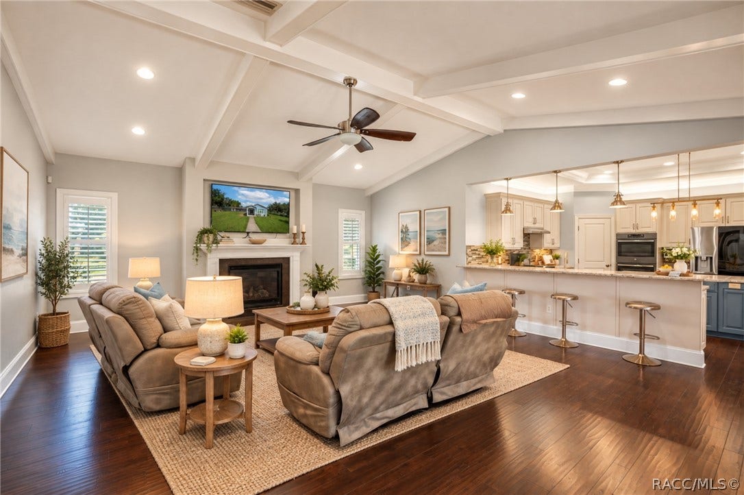 302 S Apopka Avenue, Inverness, FL 34452 VS