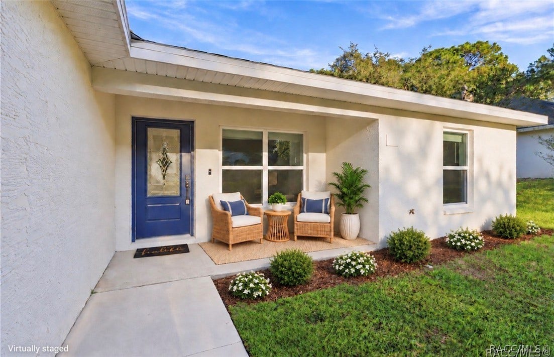 9025 N Hammond Way, Citrus Springs, FL 34434 This is a Virtually Staged photo.
