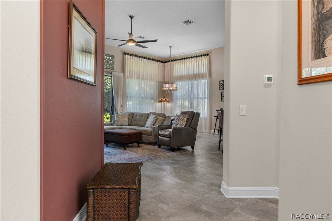 The entry foyer gives you a glimpse to the great room.
