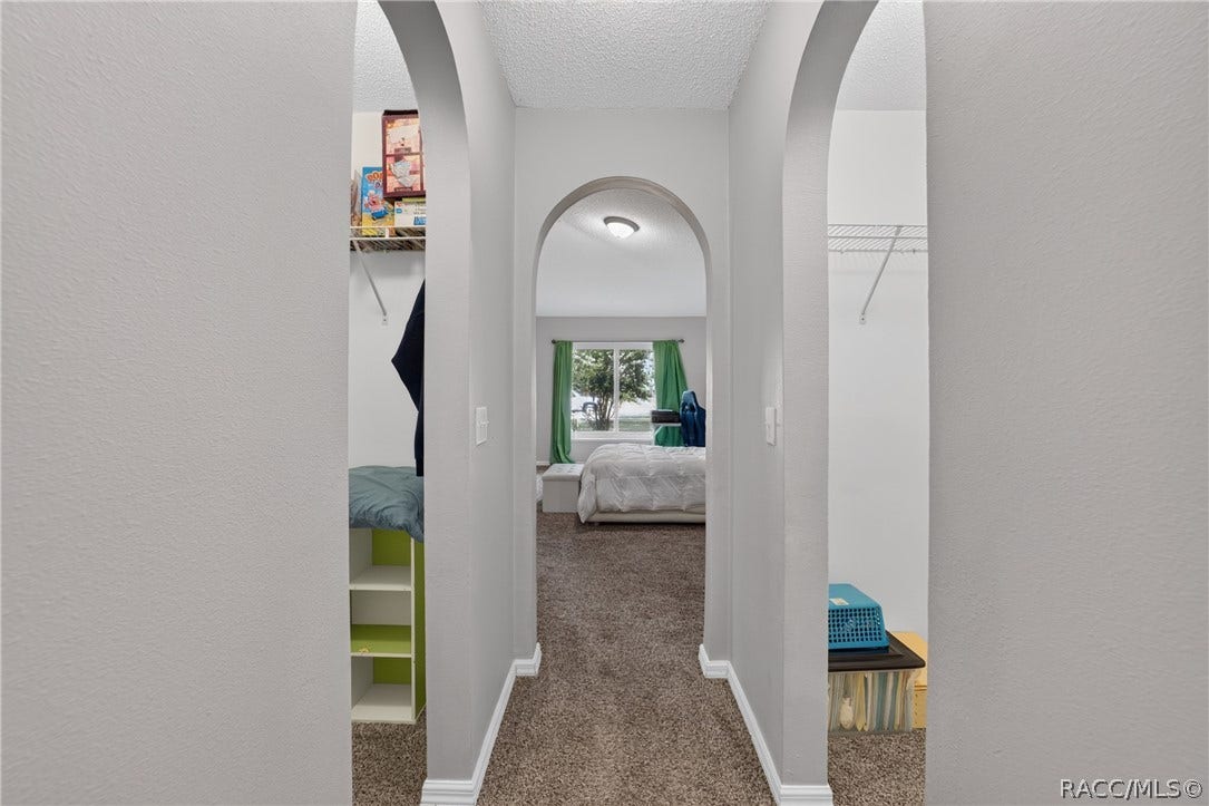 8364 N Pocono Drive, Citrus Springs, FL 34434 Primary Bedroom - Dual Walk-in Closets