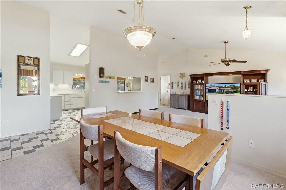 GATHER AROUND THE TABLE! Enjoy the comfortable FORMAL DINING AREA w/an open connection to the living room & kitchen!