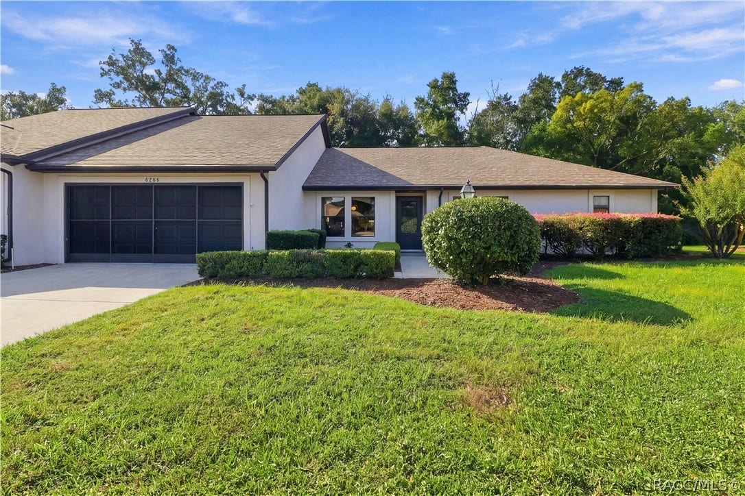 WELCOME HOME TO MEADOWCREST! CURB APPEAL THAT SHINES! Welcoming front elevation features a contrasting DARK GARAGE DOOR, covered entry & beautifully maintained landscaping!