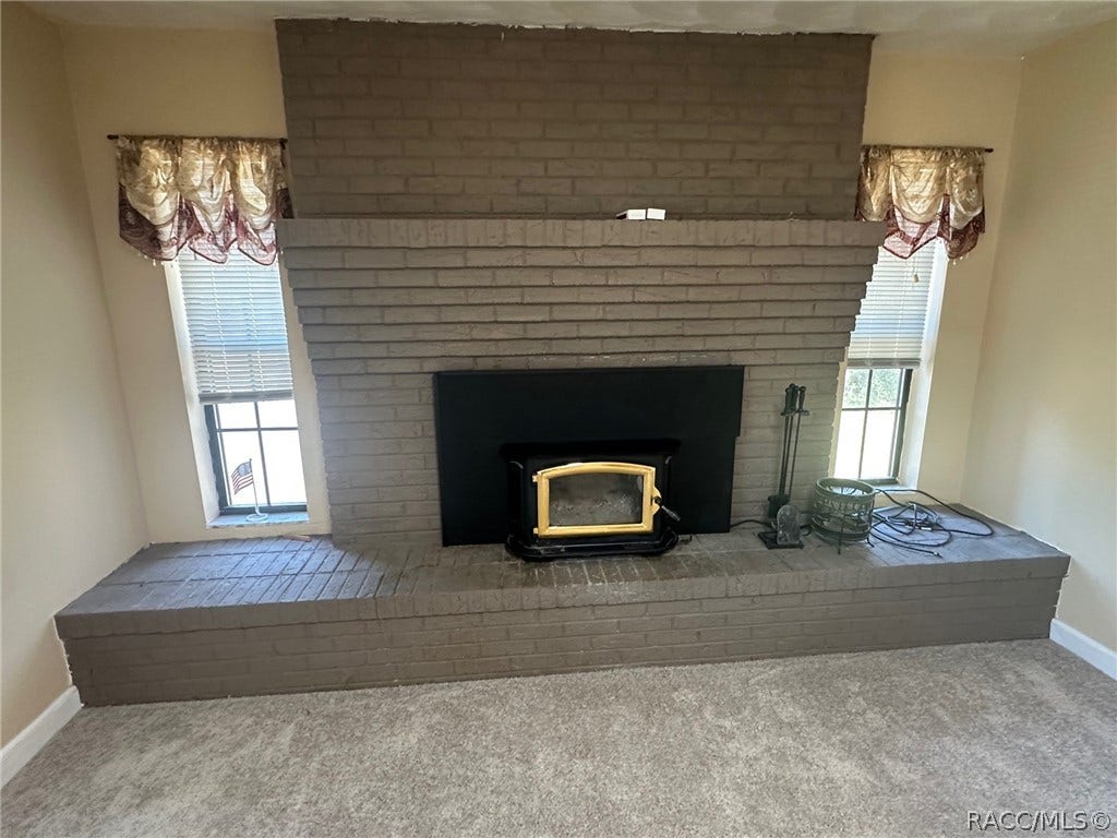 3409 W Corrie Leath Lane, Dunnellon, FL 34433 Wood burning fireplace