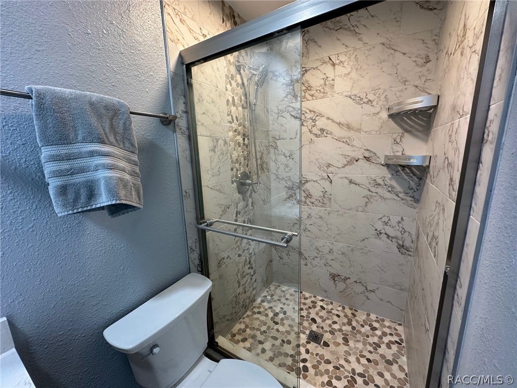 3409 W Corrie Leath Lane, Dunnellon, FL 34433 Master bath remodelled shower