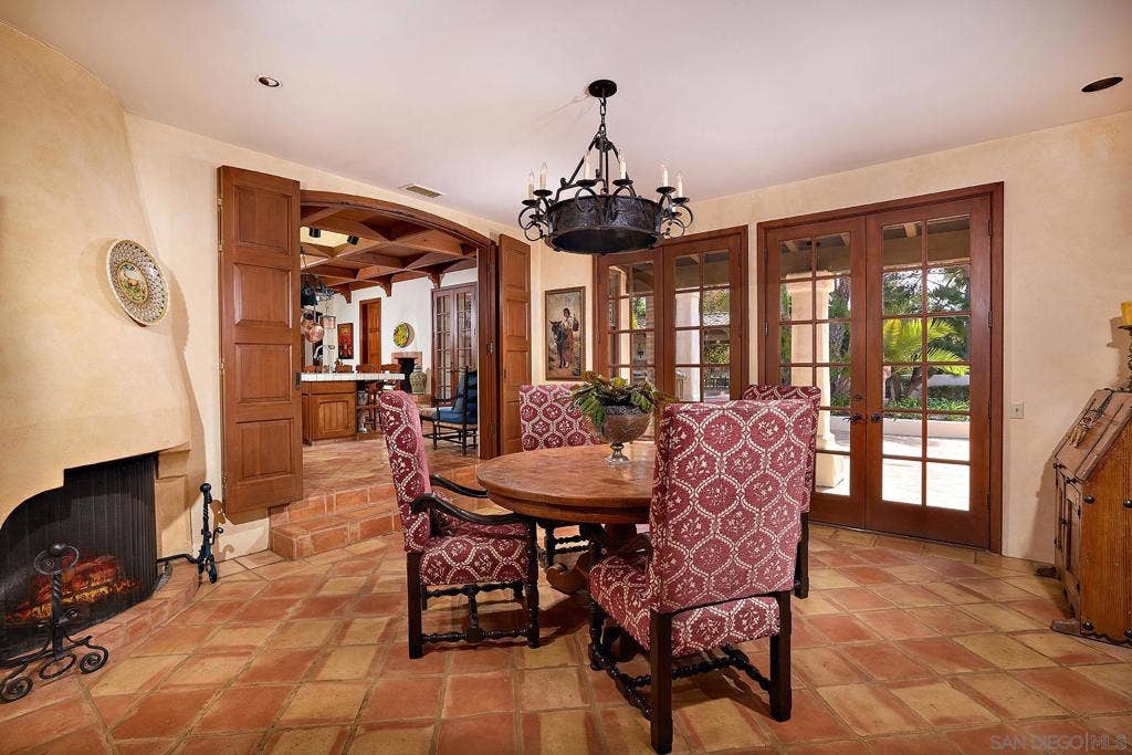 "The Cabana" relax and enjoy connectivity in the middle of it all just off the kitchen and living room and warm to the fireplace.