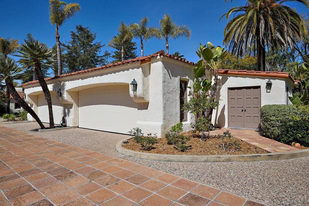 Caretaker Apartment and 5 Car Garage.