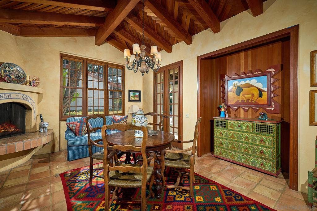 Bedroom 4 in the main house off the kitchen with its own entry and full bath, fireplace and access to the patio and pool.