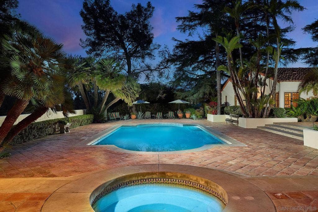 Pool and hot tub in one of a kind setting.