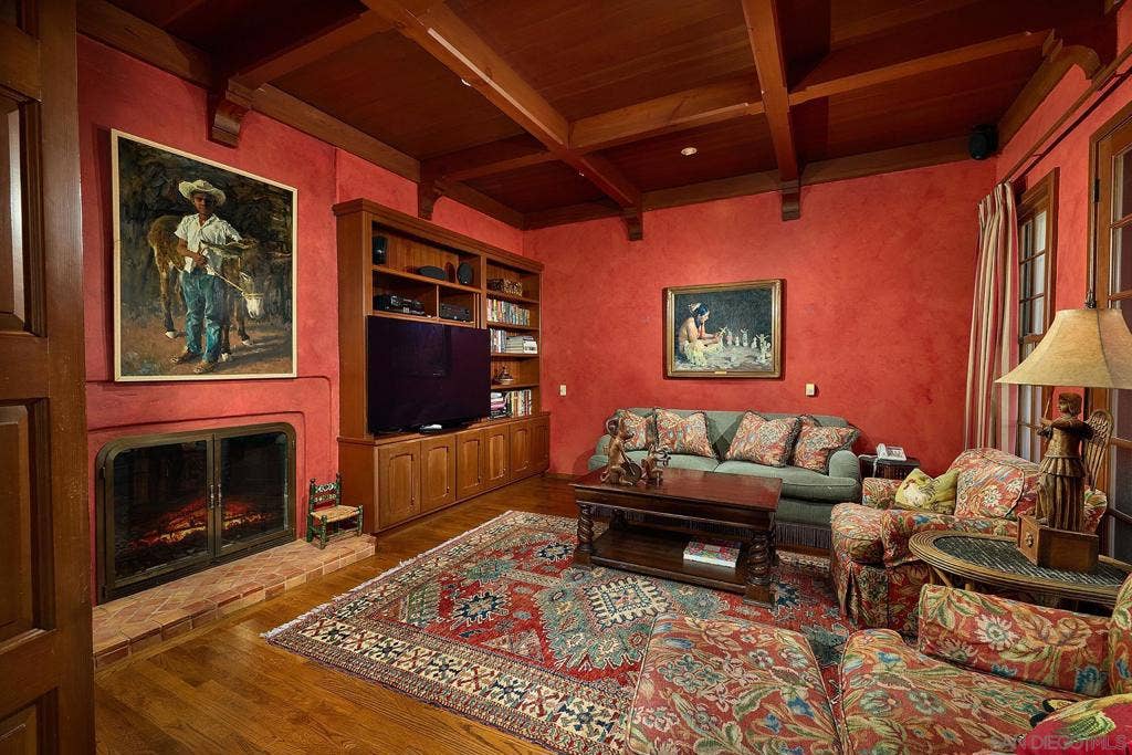 Custom feel and look in the den with fireplace.