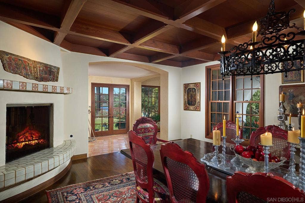 Lilian Rice style at its finest with view of the lake and fireplace.