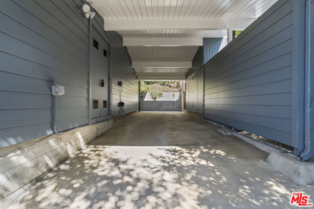 Carport with Storage Closets