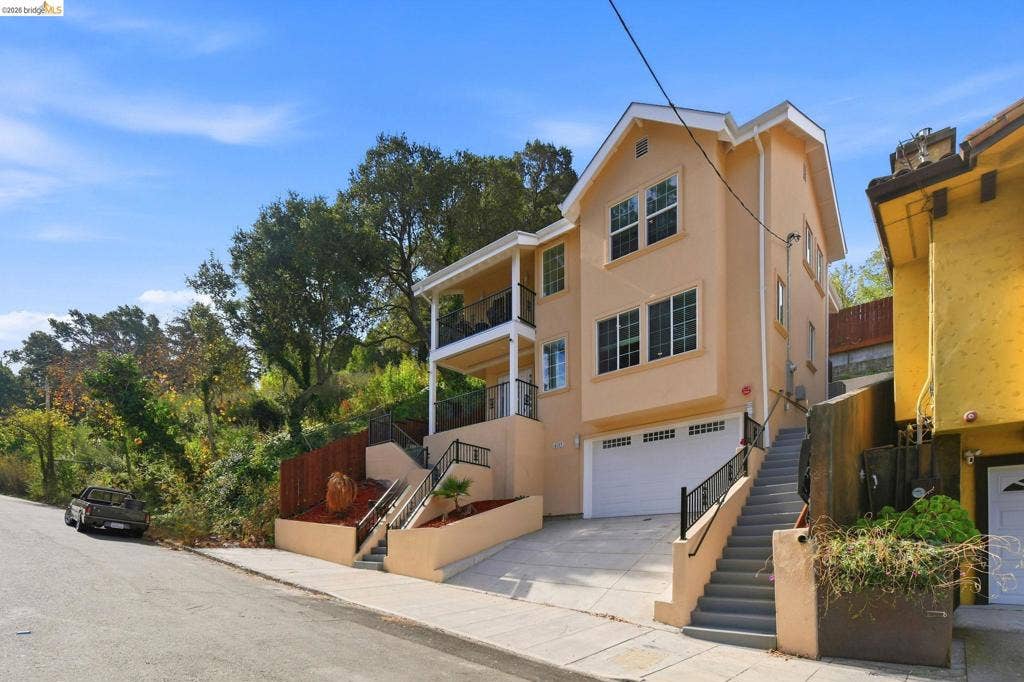 Multi-level stucco exterior with an integrated garage