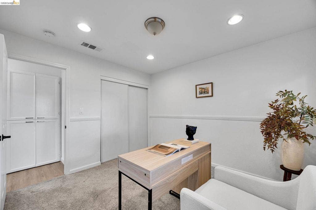 1509 Poppy Way, Antioch, CA 94509 Recessed lighting, wood-finish flooring, built-in cabinetry, sliding closet doors, and wainscoting