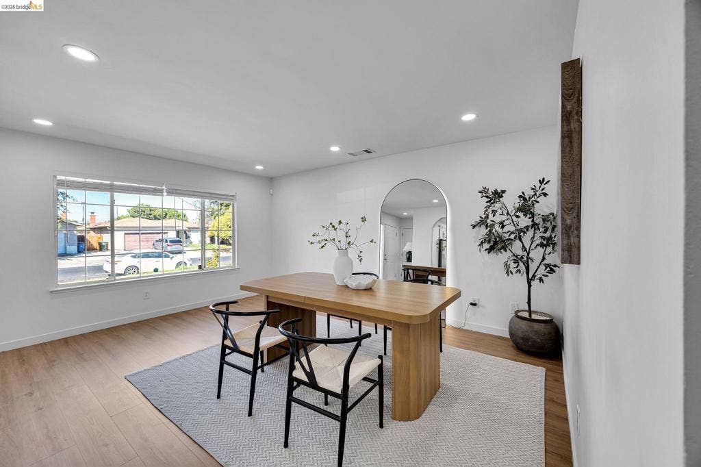 1509 Poppy Way, Antioch, CA 94509 Recessed lighting illuminates the interior, featuring wood-finish flooring and a large picture window