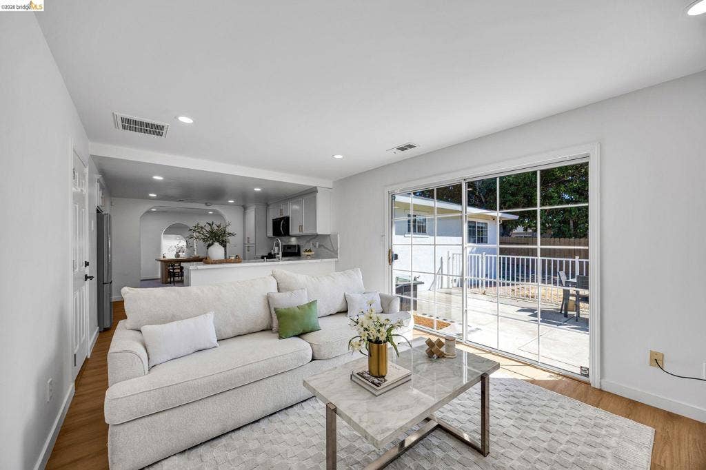 1509 Poppy Way, Antioch, CA 94509 Recessed lighting, wood-finish flooring, sliding glass patio door, and open concept design
