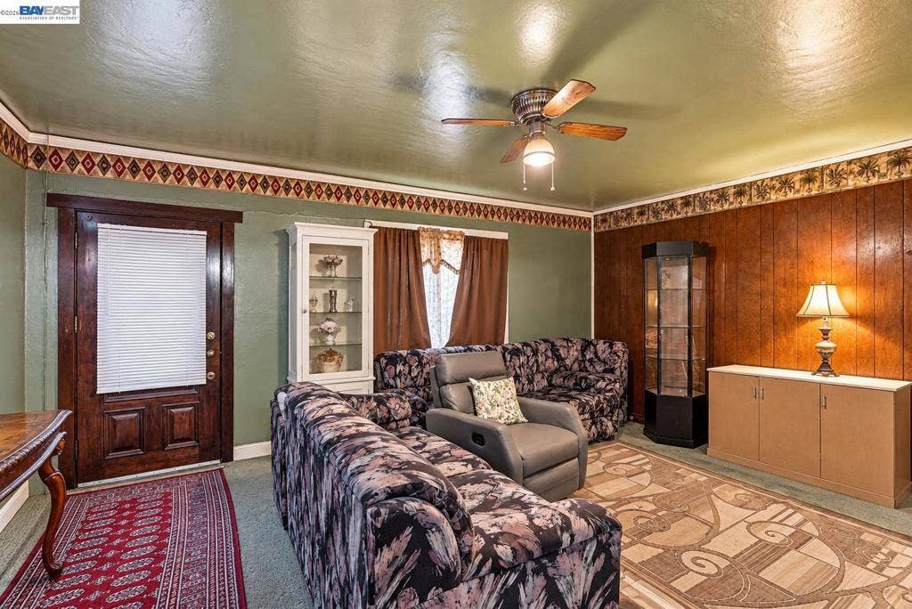 1473 82nd Ave, Oakland, CA 94621-2201 *Please note image has been virtually decluttered for visualization purposes* Refer to original photographs and in-person viewing for actual property condition.