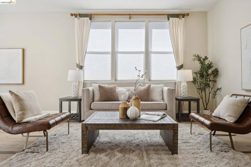 5503 Rainbow Cir, Santa Rosa, CA 95409 Triple-pane window assembly featuring natural light exposure and wood-finish flooring