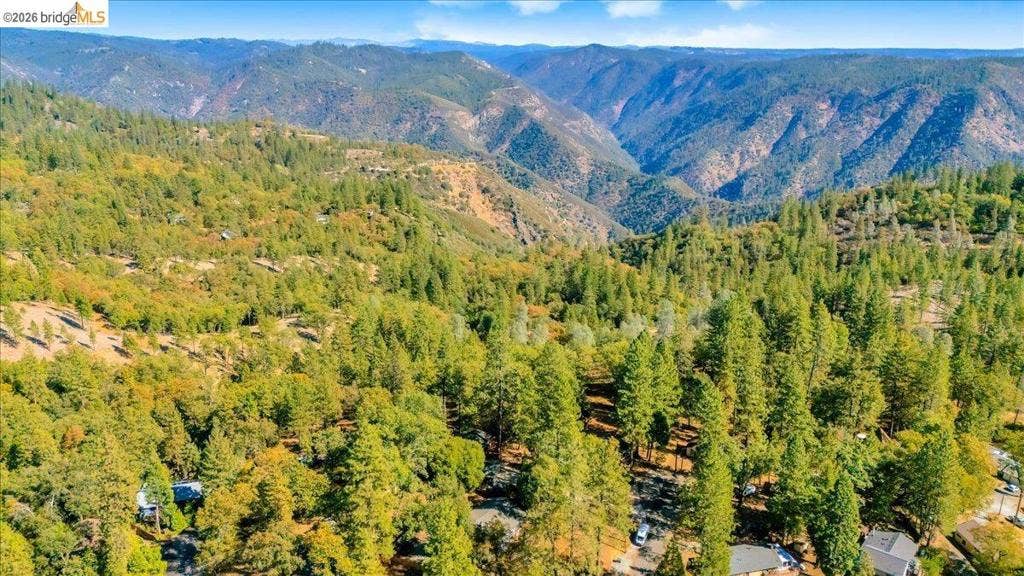 5827 Lookout Ct, CA 95233 Expansive mountain and canyon topography featuring dense evergreen forests and varied natural terrain
