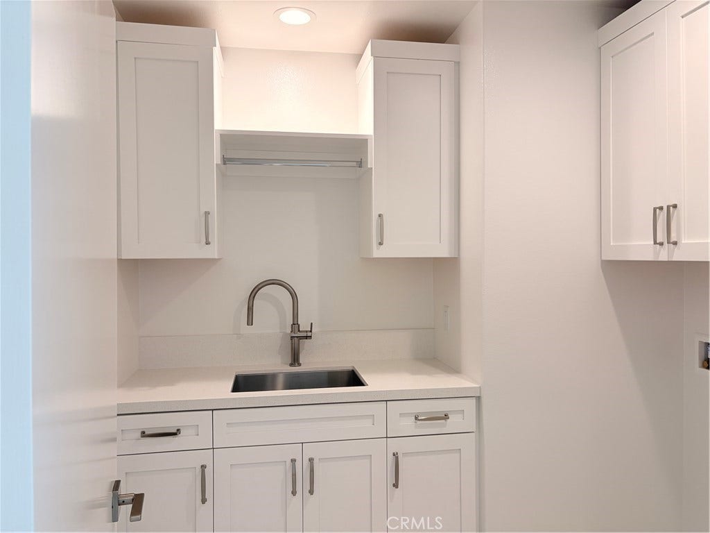 348 Plume Way, Montebello, CA 90640 Cabinets inside the laundry room