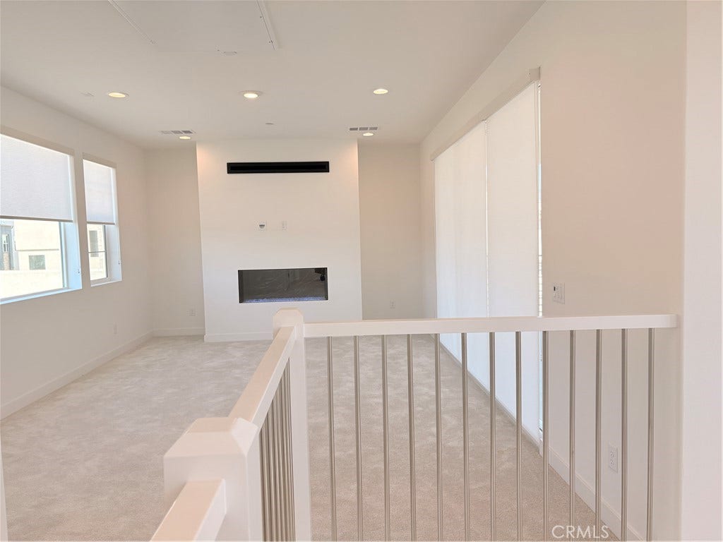 348 Plume Way, Montebello, CA 90640 Generous space for game room with a cozy fireplace