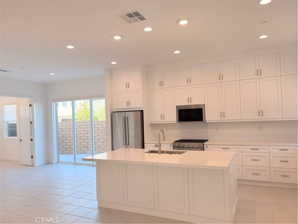 348 Plume Way, Montebello, CA 90640 Open area of dining and kitchen area