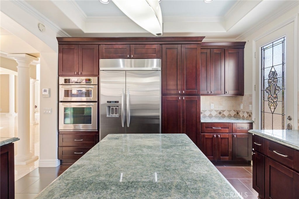 21819 E Chestnut Court, Walnut, CA 91789 custom built refrigerator with granite space for cooking book