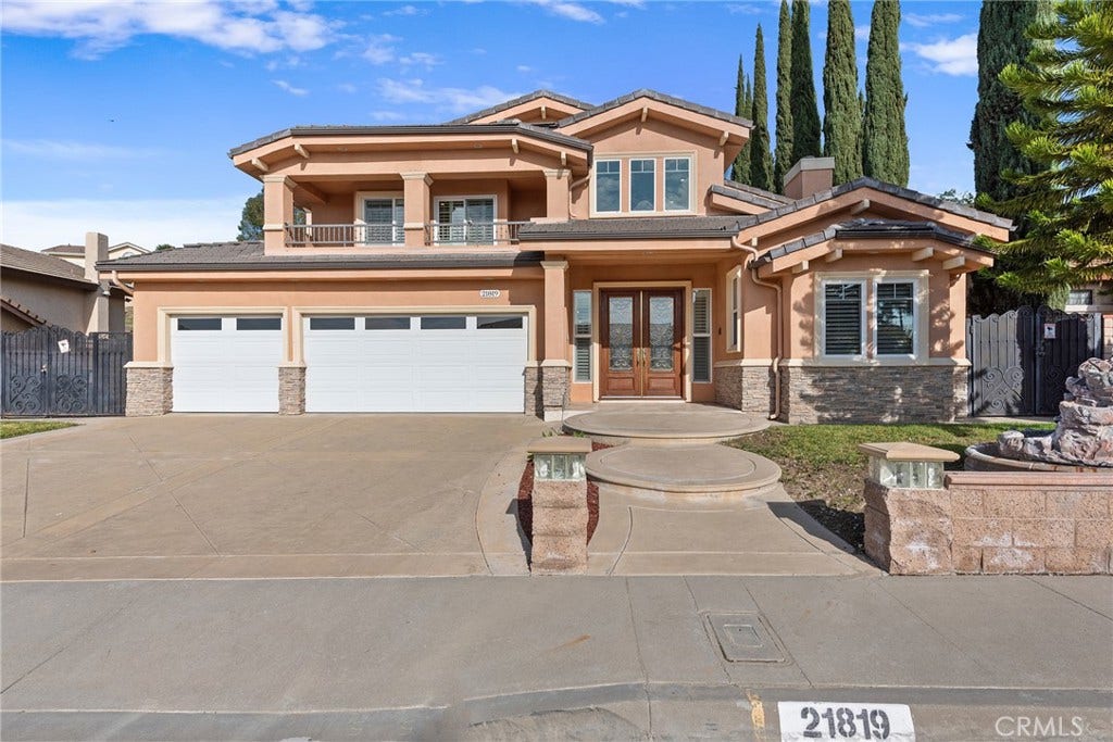 21819 E Chestnut Court, Walnut, CA 91789 Imagine living in this custom dream home