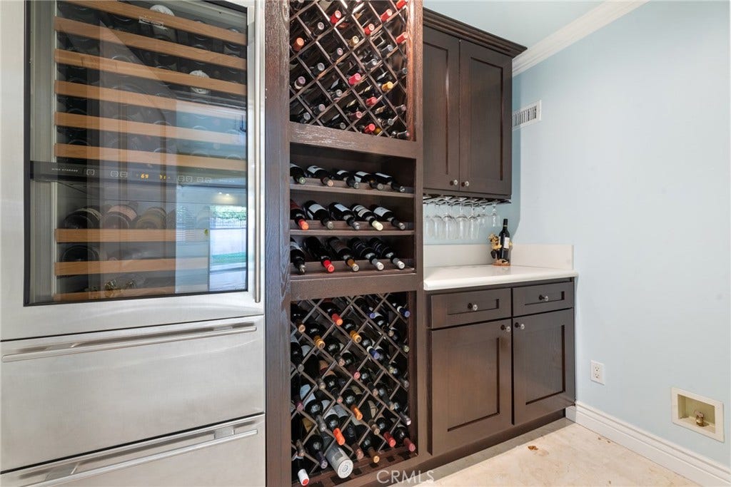 21819 E Chestnut Court, Walnut, CA 91789 Wine room with custom cabinet and refrigerator