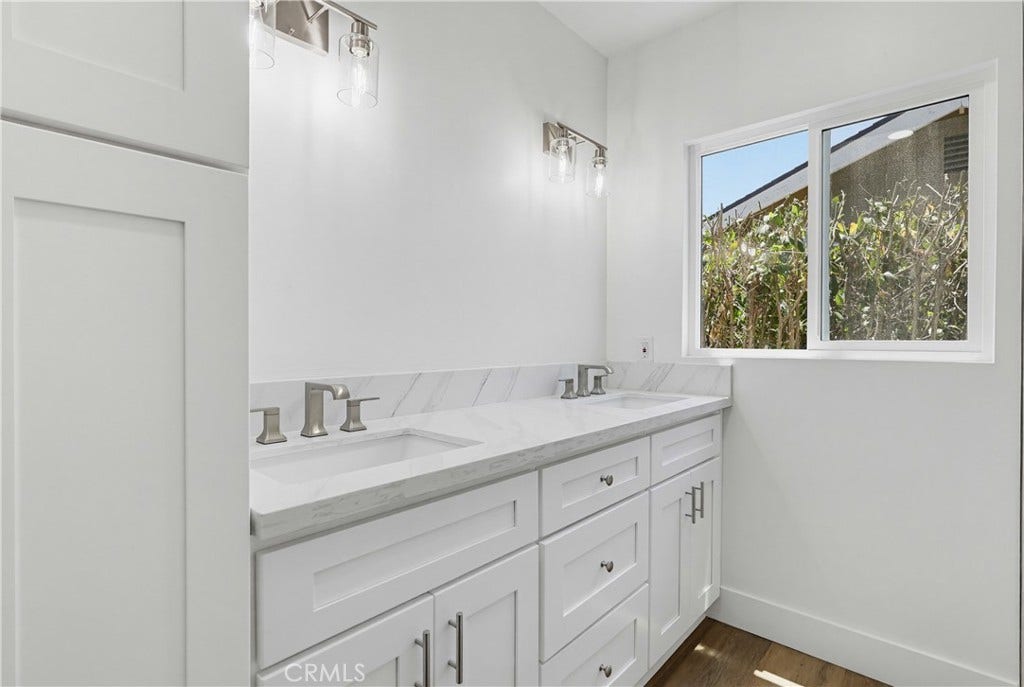 1532 E Old Badillo, Covina, CA 91724 Hall bath with linen cab