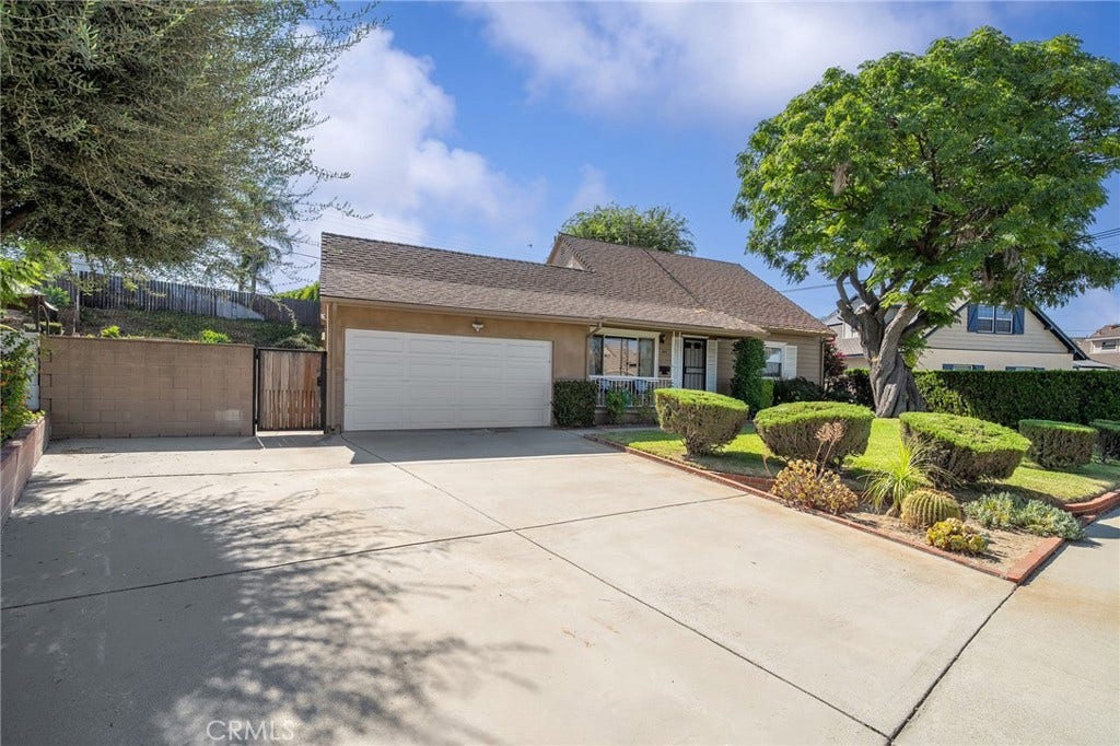 604 N Charter, Covina, CA 91724 Another view of the property showing plenty of parking and lovely landscaping.