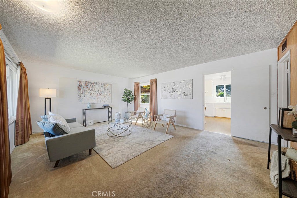 604 N Charter, Covina, CA 91724 There is hardwood under the carpet. Througway opens to kitchen/dining.