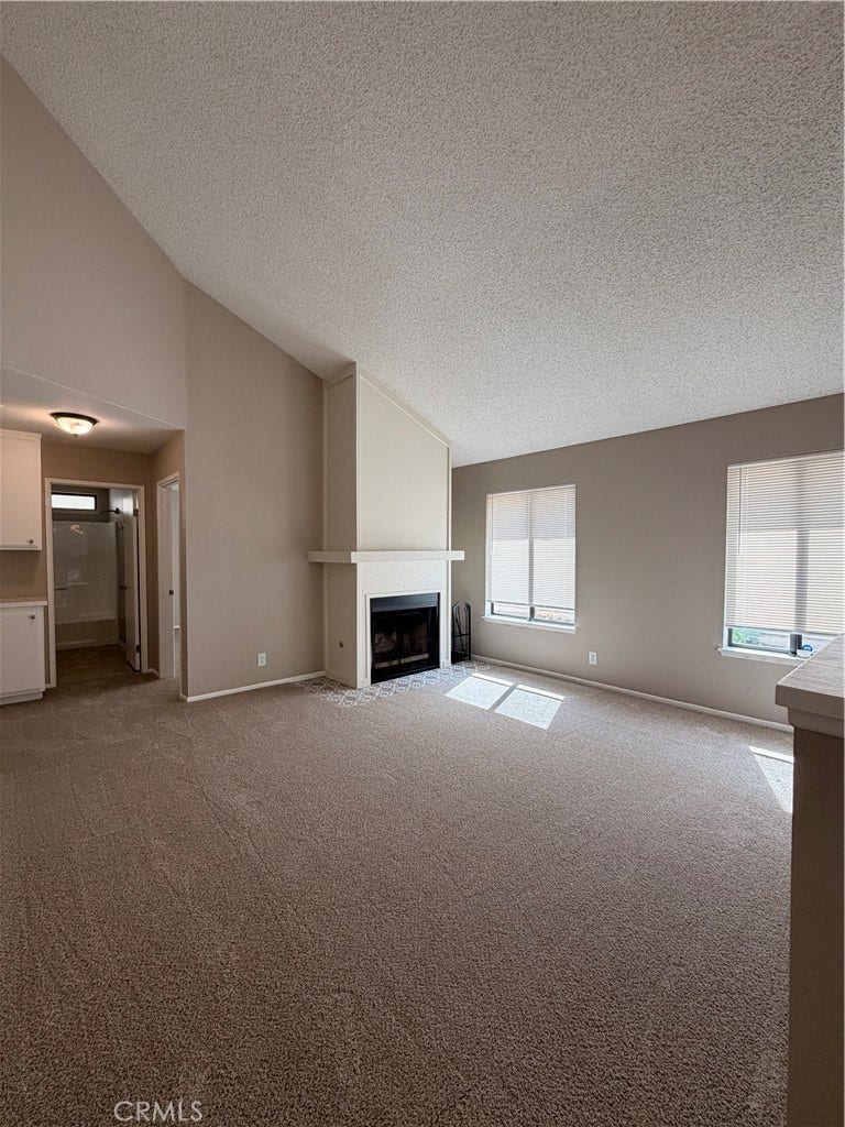 16241 Tokay, Victorville, CA 92395 Newer Carpet with fireplace.